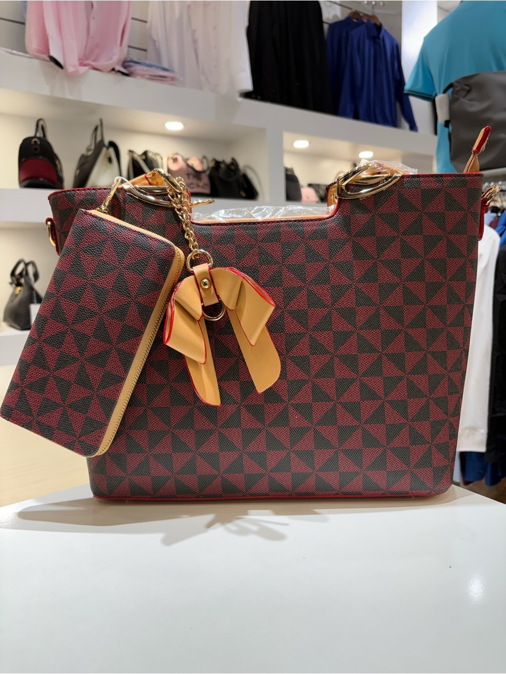Stylish Red Geometric Tote Bag with Tan Bow Accent